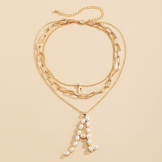 Geometric letter inlaid pearl multi-layered necklace, hip-hop fashion trend