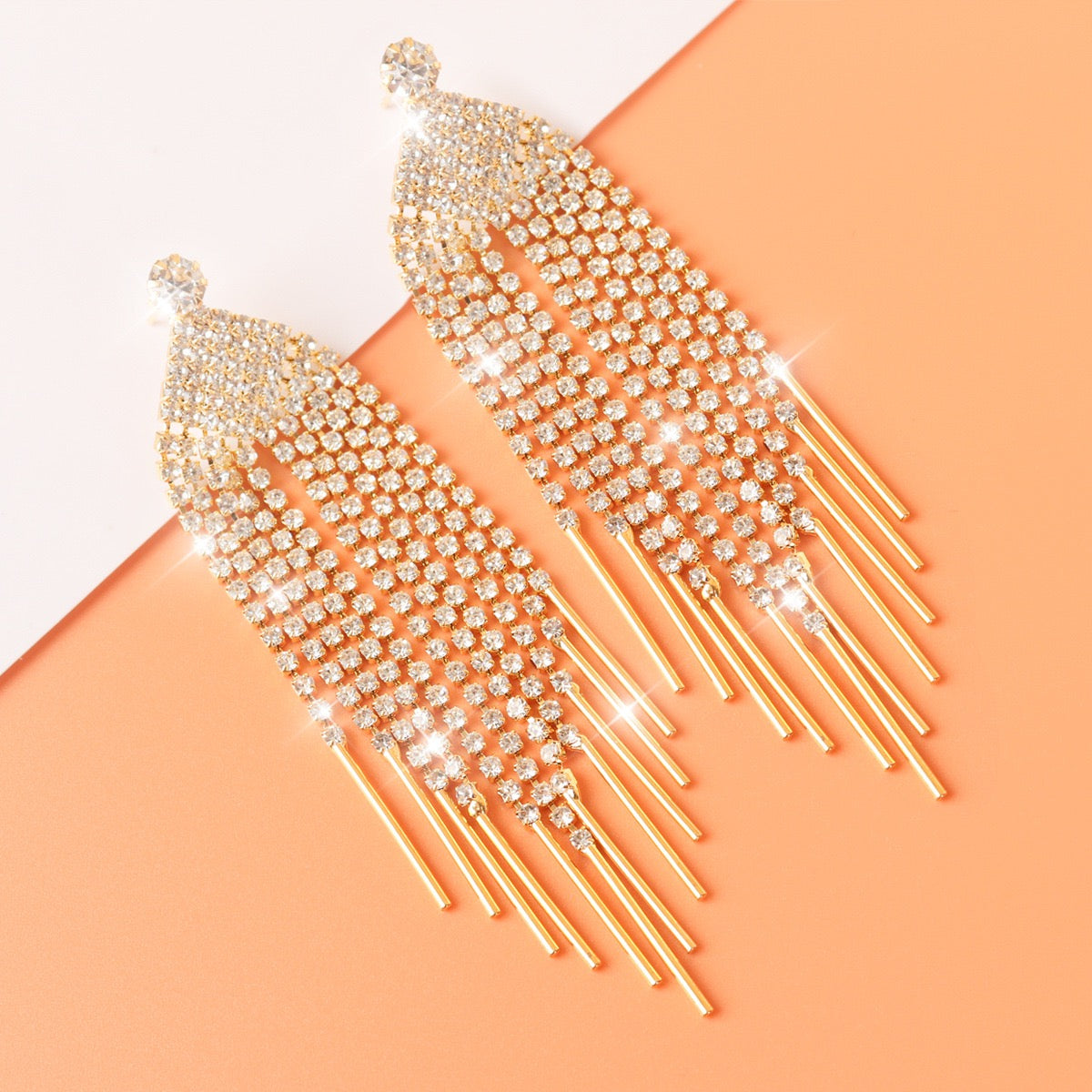 Fashionable gold earrings with tassel design, suitable for wearing at banquets and dinners